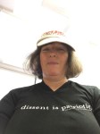 "Act justly, walk humbly" on my hat, and wearing my ACLU t-shirt, "Dissent is patriotic."