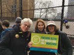 Judy Stern, her friend Joanne, and me with AJWS sign